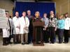 March 20, 2013 Press Conference to Accept Federal Funds. Left to right:  Lani Graham, MD, MPH, Steve Diaz, MD, FACEP, Joel Kase, DO, Immediate Past President, Maine Osteopathic Association, Dieter Kreckel, MD, President, Maine Medical Association, Sen. Geoffrey Gratwick, MD, Rep. Linda Sanborn, MD, Rep. Jane Pringle, MD, Kenneth Christian, MD, Rep. Ann Dorney, MD, Rep. Anne Graham, PNP, and Kirsten Thomsen, PA.